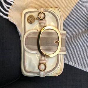 Juicy Couture cream patent clutch